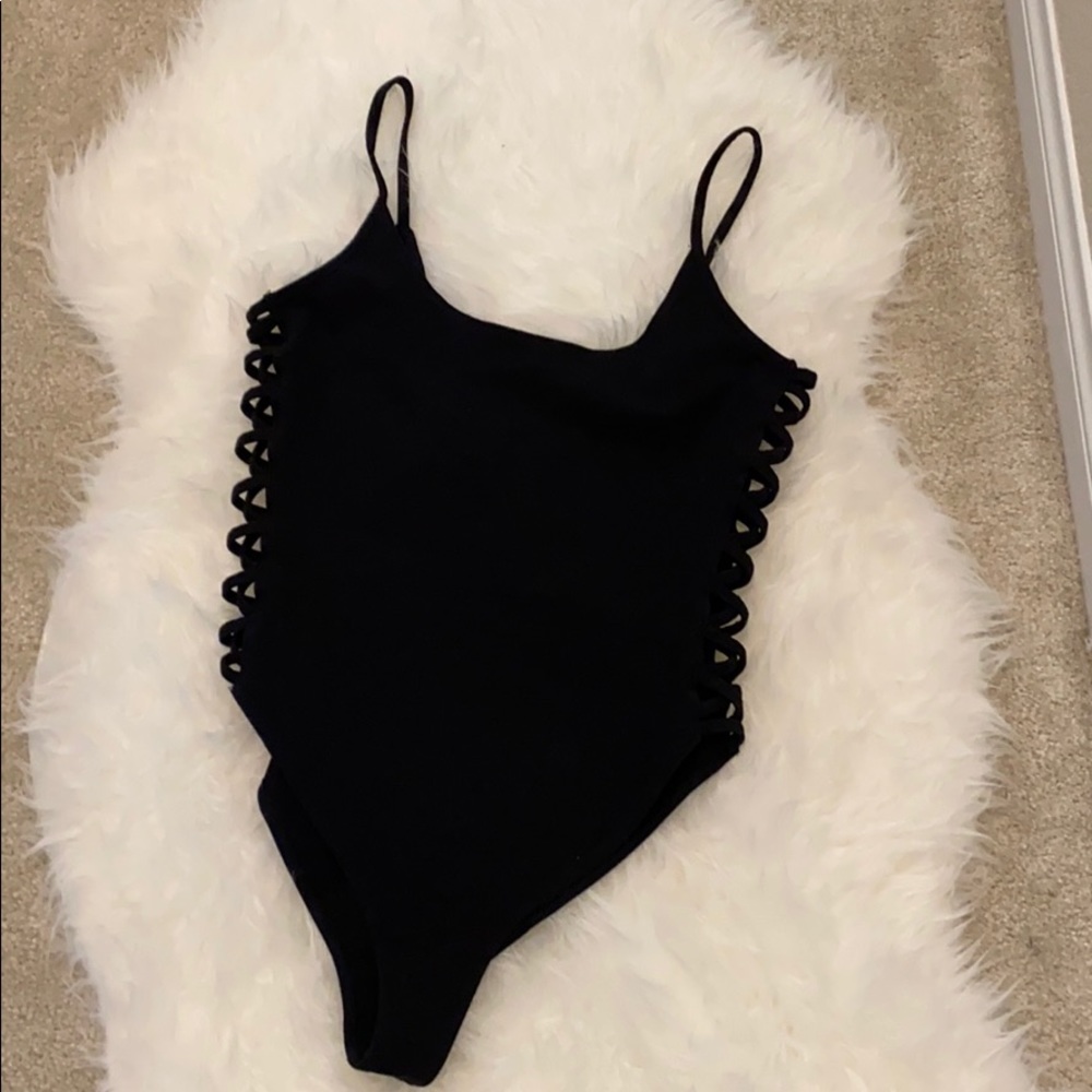 Black bodysuit with side crisscross opening